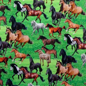 Fabric design swatch showing horses in a field