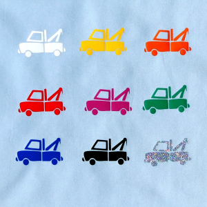 Fabric swatch with tow truck motifs