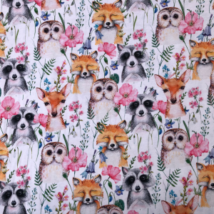 Fabric with a owl, racoon and fox design